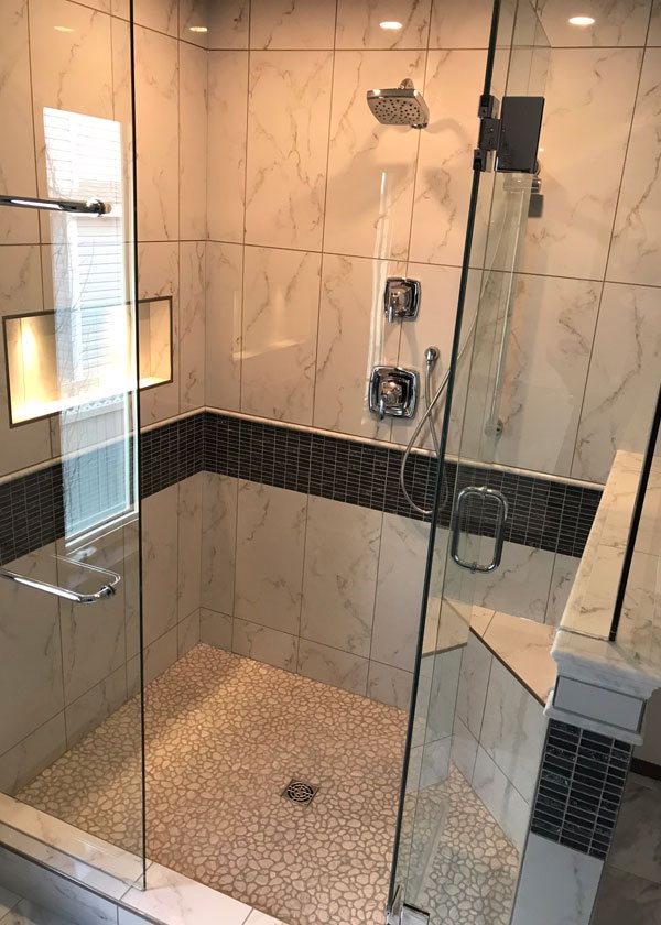 Bathroom with a custom tiled walk-in shower