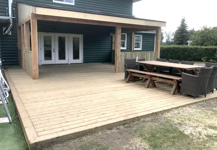 Covered backyard deck built by Valley Works