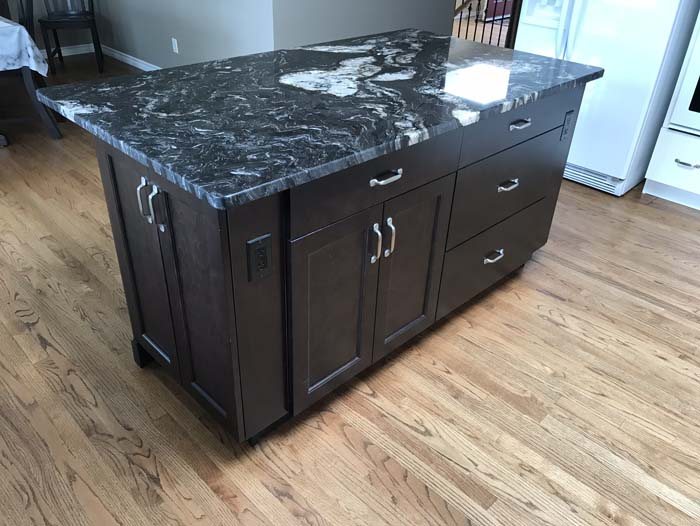 Renovated kitchen with a large centre island and pendant lighting